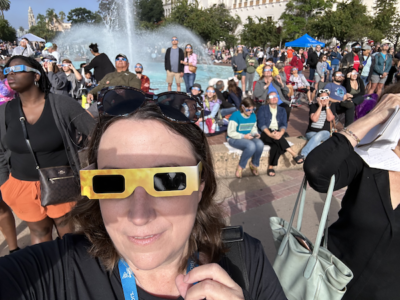 The author and crowds safely watching a solar eclipse