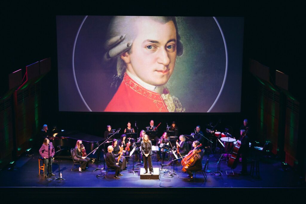 Image of Bach, over orchestra and myself.